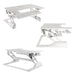 Newstar Sit-Stand Desktop Workstation - White. This ergonomic product holds up to 15kg, while staying steady and solid at any height (13-50cm). Large work surface (90 x 64 cm) accommodates two monitors or a monitor and a laptop. Ergonomic keyboard tray (70 x 30 cm) keeps staggered height between keyboard and monitor to prevent neck strain. Dual squeeze handle gas spring lifting mechanism allows to easily moving the desk up and down, even with your computer equipment. - Newstar have over 20 years